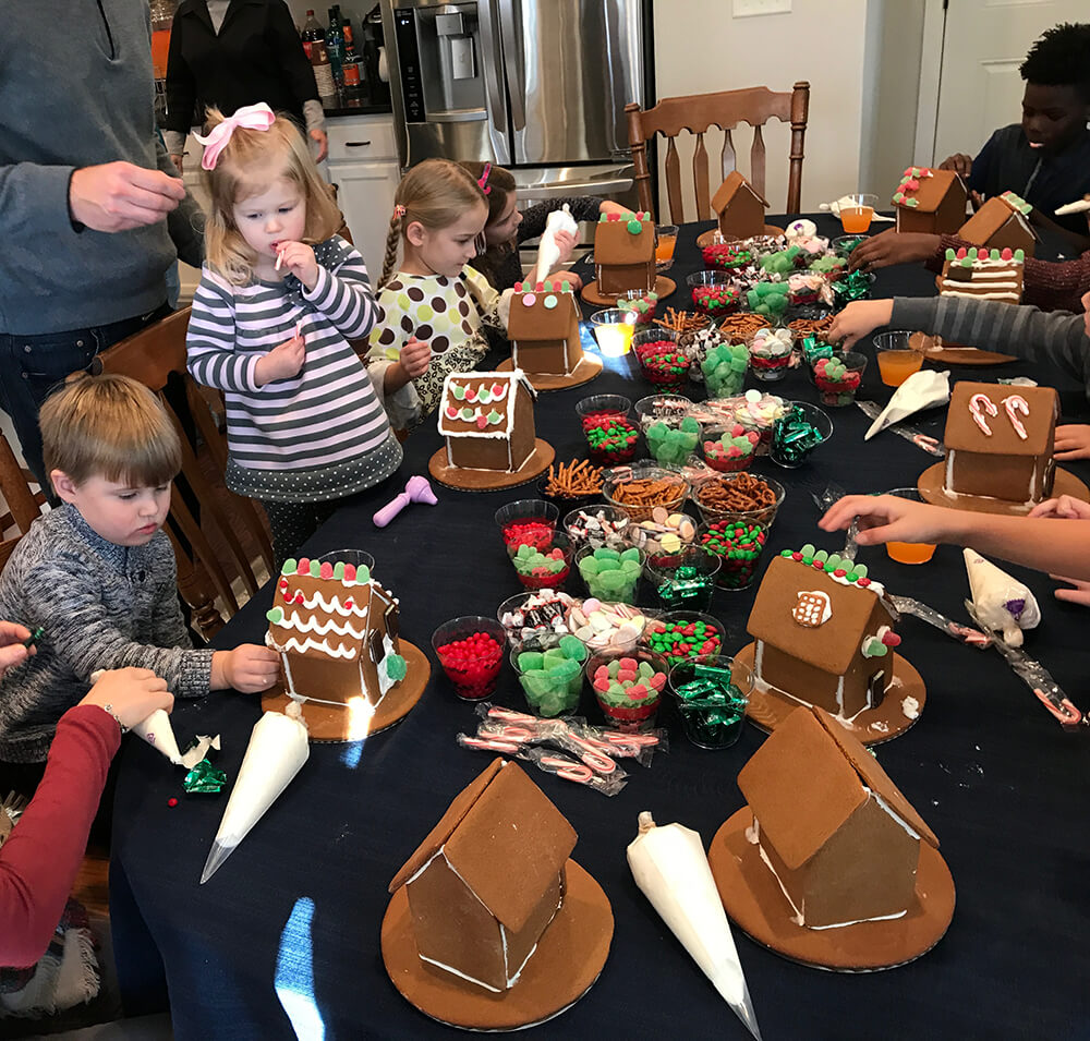 A gingerbread house decorating party